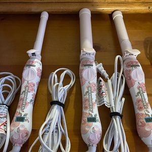 The Beachwavers Co Curling Irons. Sizes are S. 75, S 1.25, and S 1. They are NWT